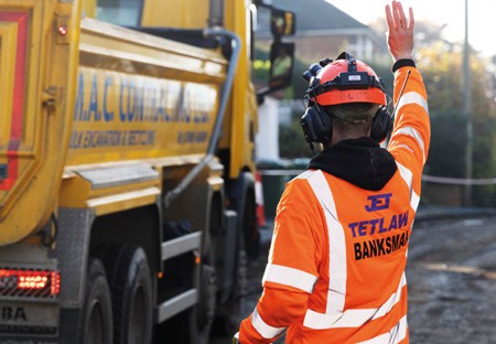 Jet Plant operator directs vehicles